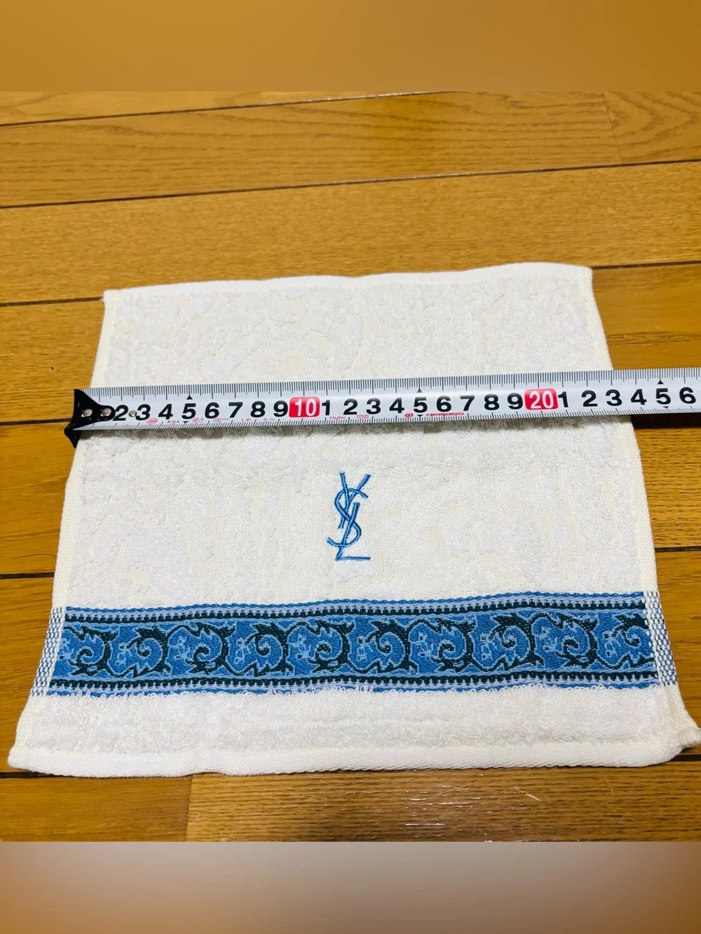 Yves Saint Laurent White Towel with Blue Embroidered YSL size 23cm 9”